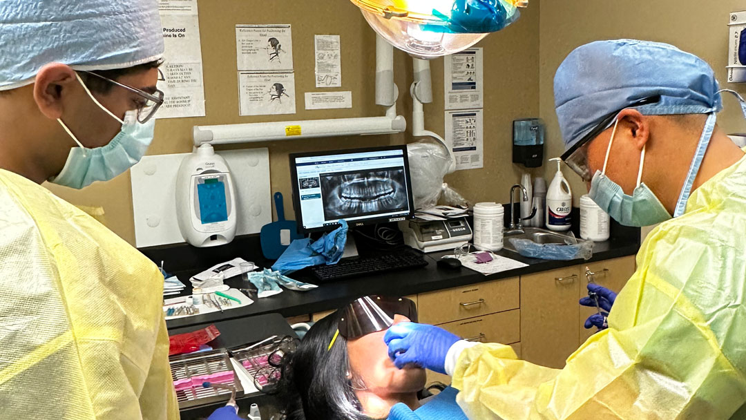 Dentist working on patient